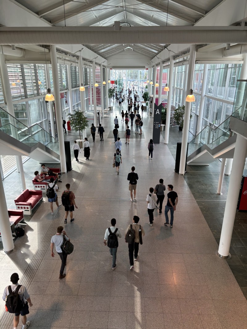 A view of attendees leaving the conference venue, taken from above