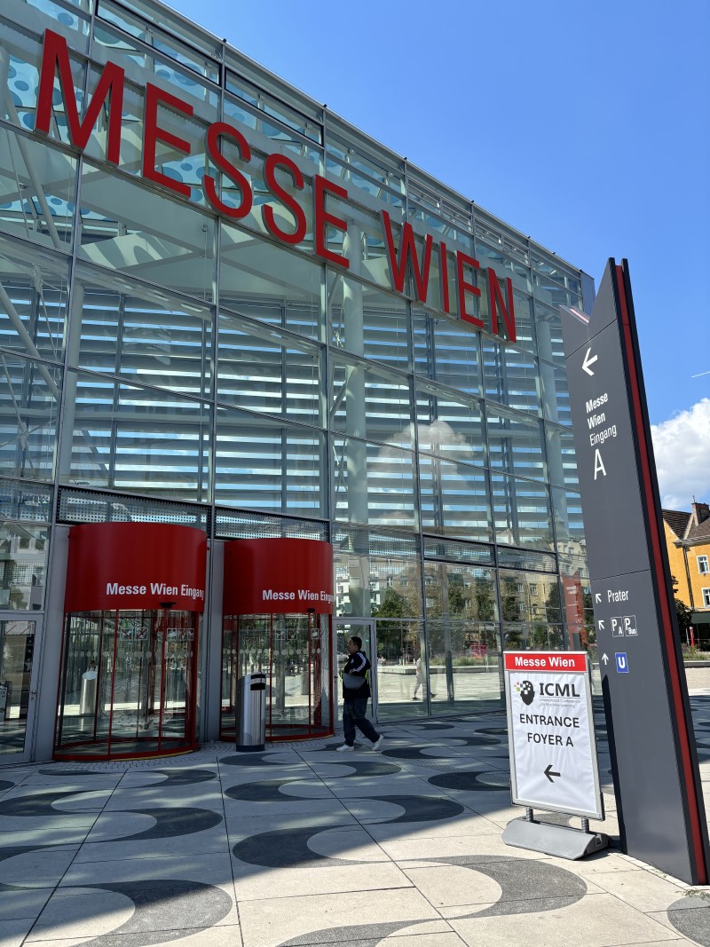 The &ldquo;Messe Wien&rdquo; conference centre, with a sign pointing to it saying &ldquo;ICML Entrance Foyer A&rdquo;