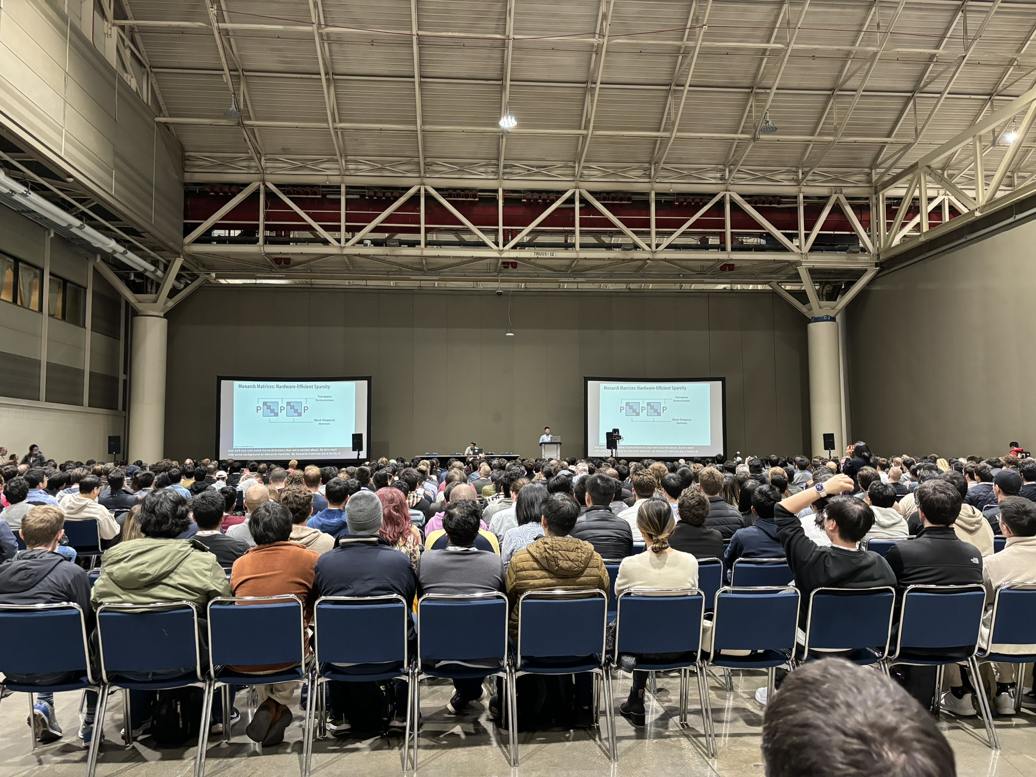 A large crowd watching one of the efficient learning talks